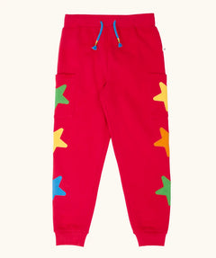 Frugi journey joggers in scarlet red with three stars appliques on each side.