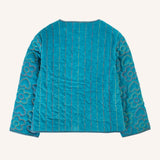 Back of the Frugi Katie quilted cord jacket in boat blue with floral pattern on arms and stripes on the back.