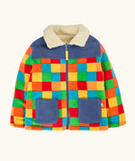 A colorful children's frugi fleece jacket with a rainbow checkered pattern, navy blue collar and pockets, and a cream sherpa lining