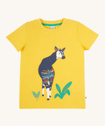 Frugi kids bumblebee okapi character t-shirt - GOTS organic cotton Frugi kids t-shirt in yellow with short sleeves and a green trim on the inside of the neck. Features an appliqué of a okapi animal on thefron next to some green plants