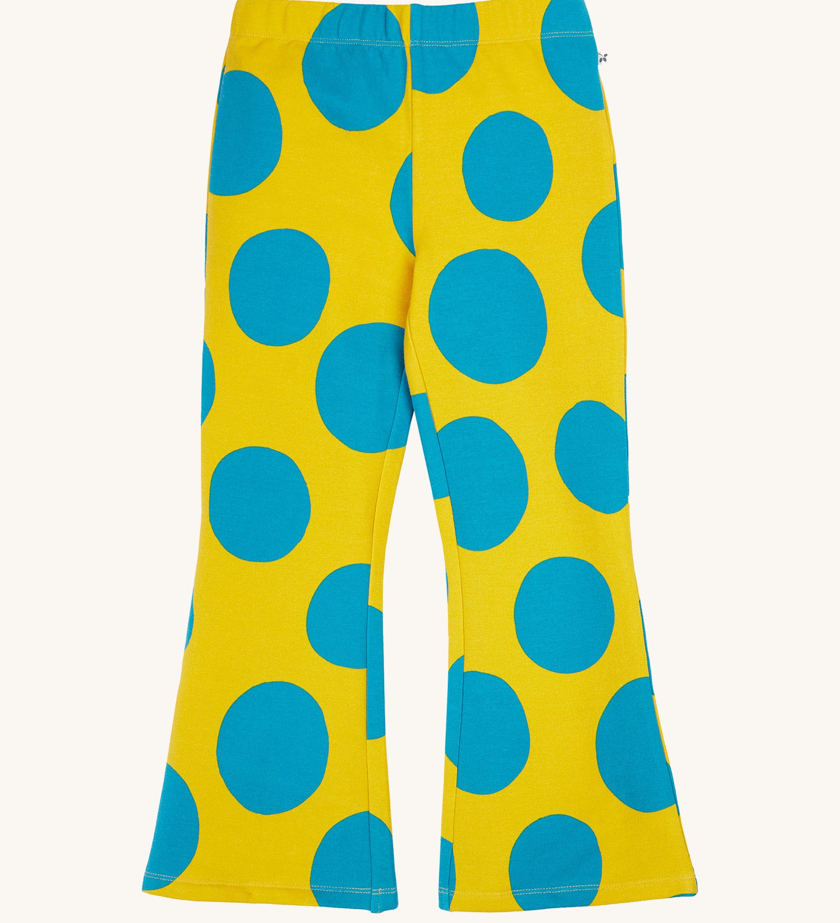 Frugi kids cosy flared leggings in super spot available at Babipur. GOTS organic cotton flared style leggings in yellow with bold blue spots. Features a elasticated waist band