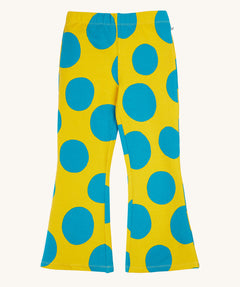 Frugi kids cosy flared leggings in super spot available at Babipur. GOTS organic cotton flared style leggings in yellow with bold blue spots. Features a elasticated waist band