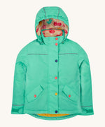 Frugi kids 3 in 1 rambler coat in dragon/mushroom colourway. A bright turquoise waterproof coat from post consumer recycled polyester. Features a removable hood and 2 side pockets with different colour poppers