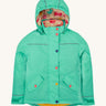 Frugi kids 3 in 1 rambler coat in dragon/mushroom colourway. A bright turquoise waterproof coat from post consumer recycled polyester. Features a removable hood and 2 side pockets with different colour poppers