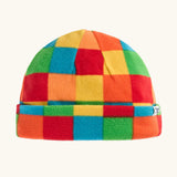 A colorful checkered kids fleece beanie hat with a small white brand tag on the side.