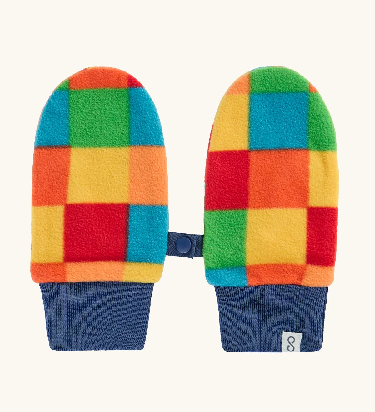 A pair of colorful fleece mittens with a patchwork pattern of red, orange, yellow, green, and blue squares, finished with navy blue ribbed cuffs and a small strap detail.