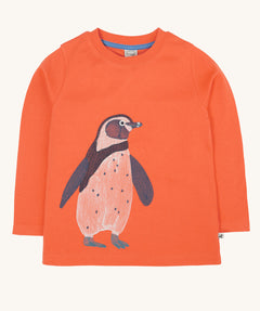 Frugi kids emroidered adventure top in salamander/penguin available at Babipur. A GOTS organic cotton top in pastel orange with a cute penguin embroidery on the front.