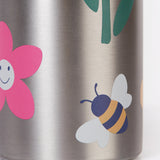 A close up of the Frugi kids Insulated bottle showing a playful bee and flower print on the stainless steel bottle