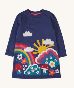 Frugi kids kari dress in navy/rainbow available at Babipur. A 100% GOTS organic cotton long sleeve dress in navy with a playful woodland inspired print on the front.