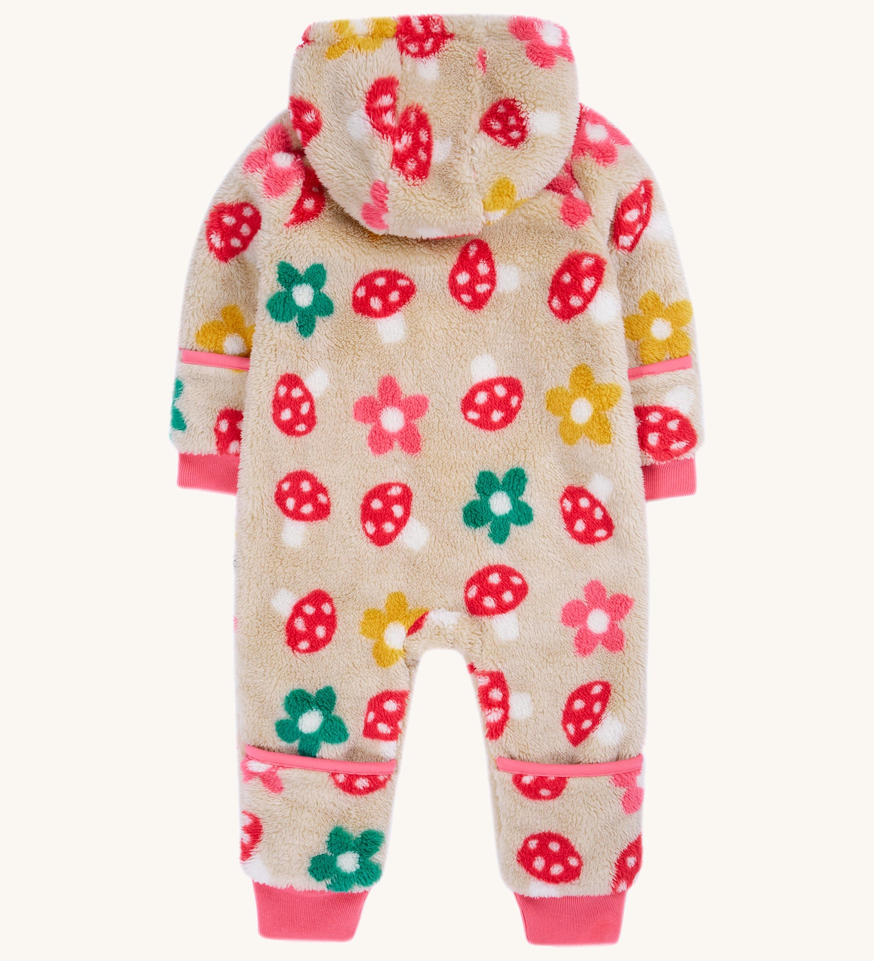 The back of the Frugi kids recycled cosy snuggle suit in mushroom fields. showing the hood and pink cuffs detail on recycled textile fabric