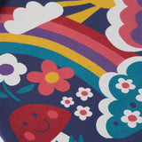 A close up of the Frugi kids kari dress in navy/rainbow showing the playful woodland inspired print detail on organic cotton fabric.