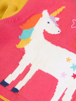 Close up of the unicorn on the back of the Frugi organic cotton cammie cardigan with a hotchpotch unicorn design. The unicorn has a colourful mane and colourful stars on it's body.