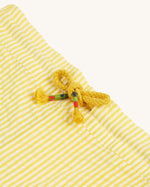  made from GOTS organic Cotton on a cream background.