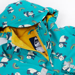 A close up of the Frugi kids panda play puddle buster all in one showing the hood detail and yellow fleece liner. Features a full length zip with velcro fasteners for a secure fit and a name tag stitched on the inside. 