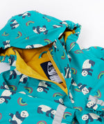 A close up of the Frugi kids panda play puddle buster all in one showing the hood detail and yellow fleece liner. Features a full length zip with velcro fasteners for a secure fit and a name tag stitched on the inside. 