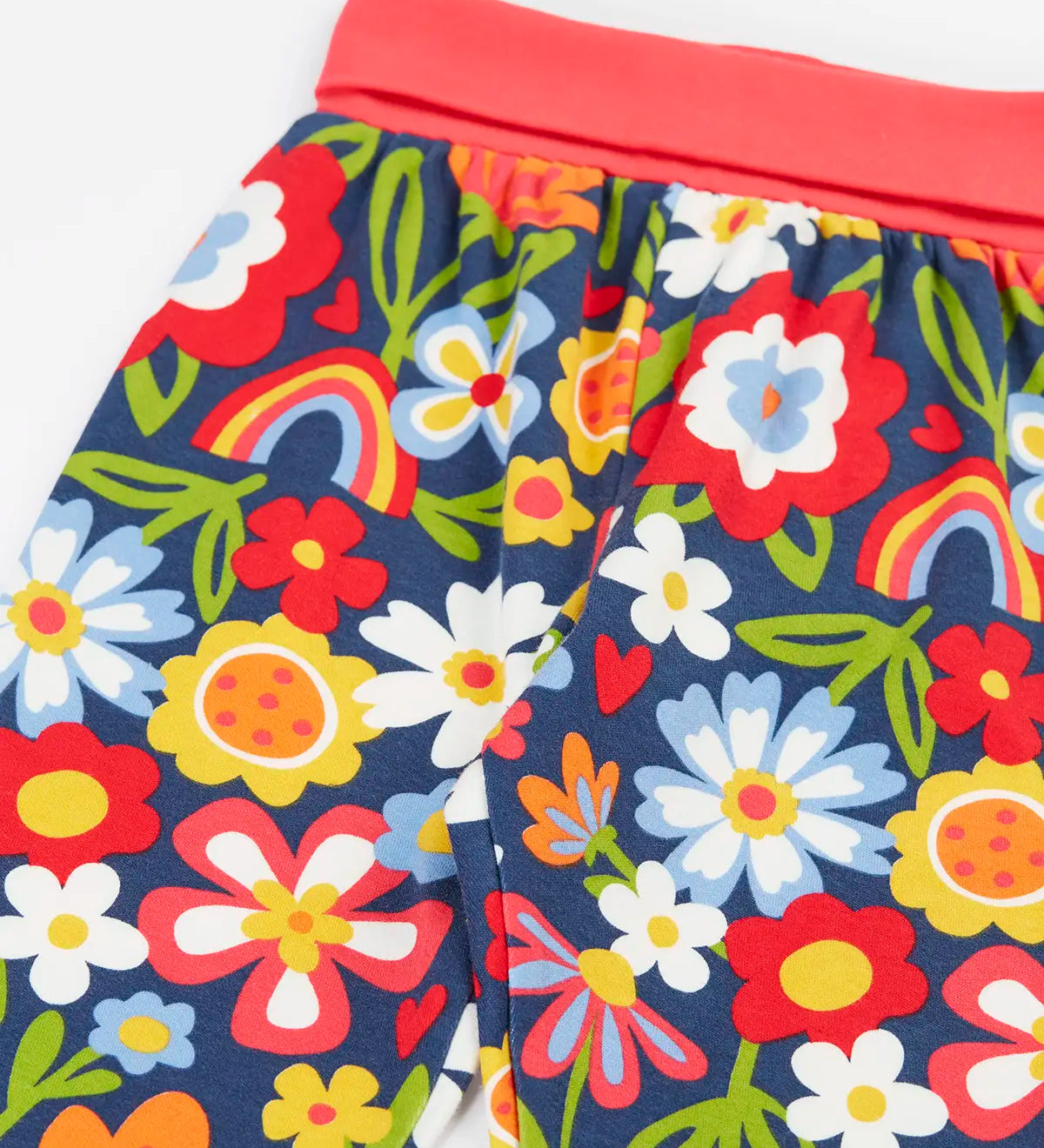 Frugi organic cotton piper printed parsnip jogger with a beautiful bunch floral print and pink waistband