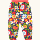 Frugi GOTS organic cotton piper printed parsnip jogger with a beautiful bunch floral print and pink waistband and leg cuffs.