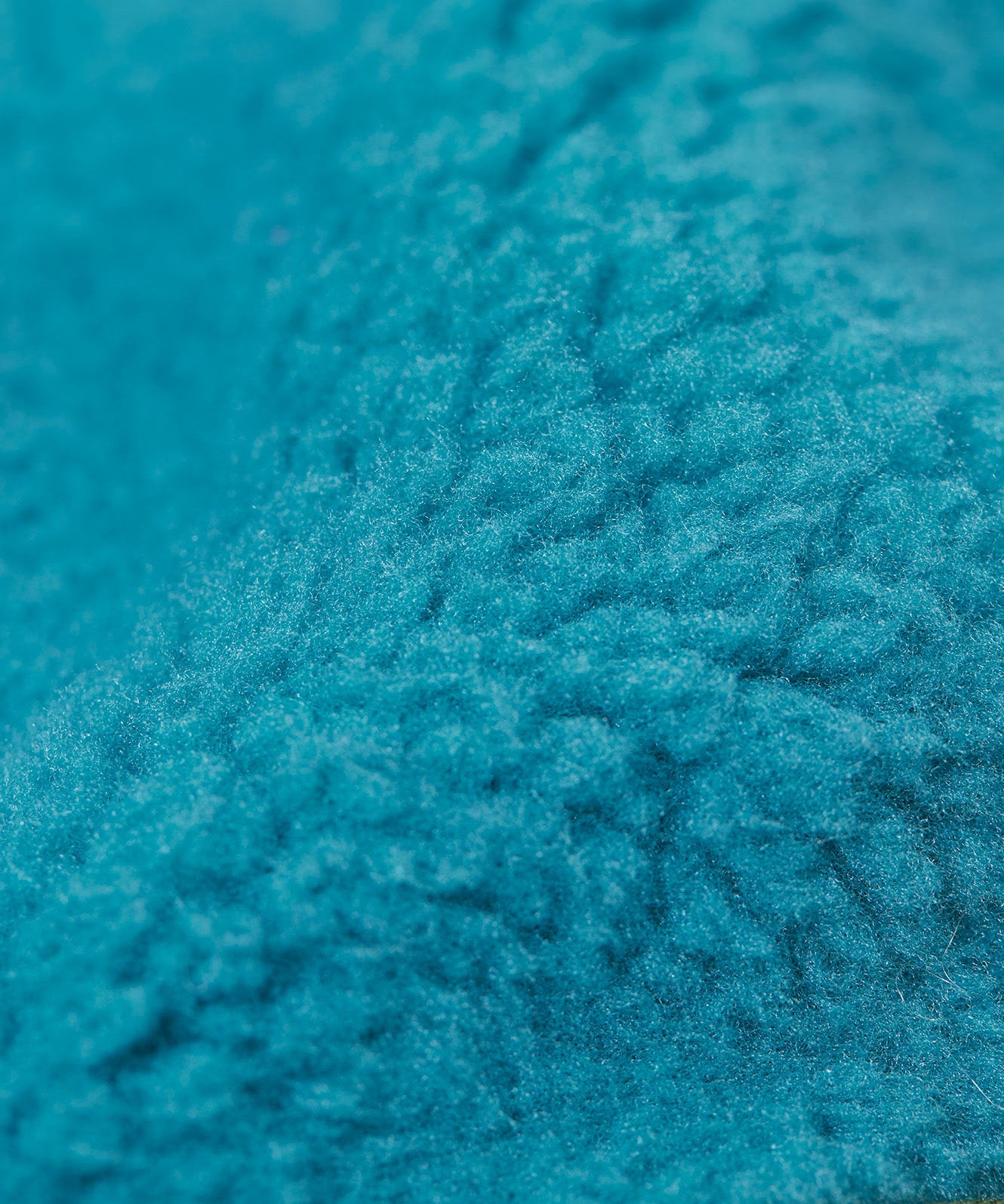 A close up of the blue fleece inner liner on the Frugi penhale khaki colourblock parka. 