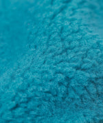 A close up of the blue fleece inner liner on the Frugi penhale khaki colourblock parka. 