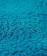 A close up of the blue fleece inner liner on the Frugi penhale khaki super spot parka. 