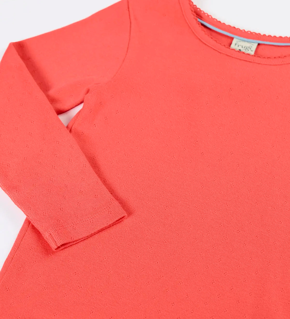 Frugi pointelle long sleeve top in rhubarb pink organic cotton with a picot trim on the neckline