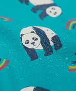 A close up of the panda print on the Frugi panda play puddle buster all in one showing water on the waterproof material 