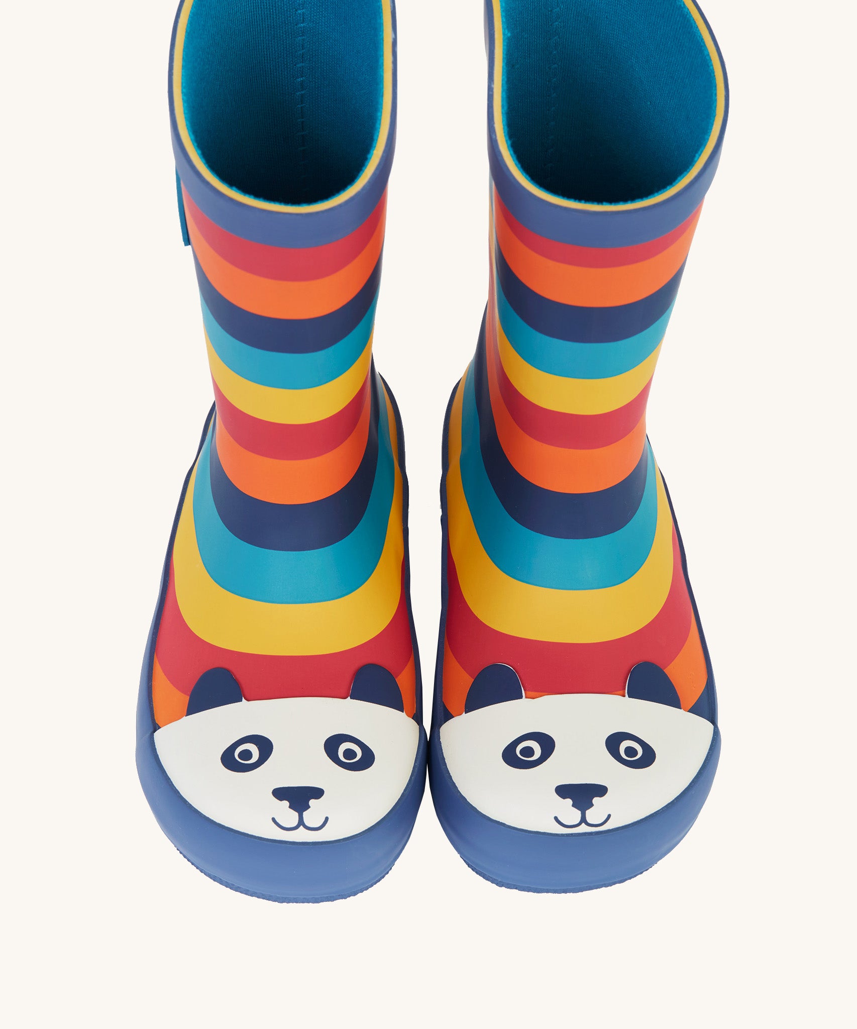 A top down view of the Frugi kids puddle buster wellington boots Showing the the navy trim and playful panda print detail on the toe cap on natural rubber material