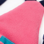 A close up of the Frugi penguin waddle snow and ski salopettes showing pink fleece detail on the bib attached to the back
