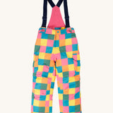 Frugi kids snow and ski salopettes in rainbow check. A recycled polyester waterproof salopettes with a bright check design. Features removable straps and bib.