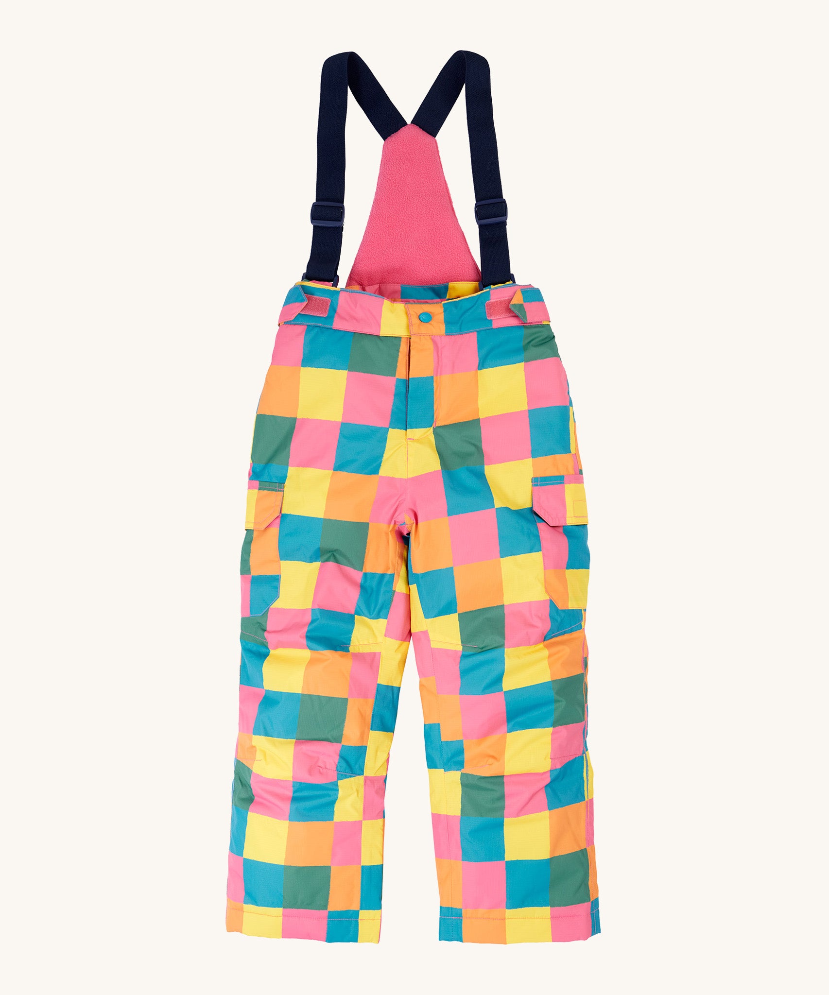 Frugi kids snow and ski salopettes in rainbow check. A recycled polyester waterproof salopettes with a bright check design. Features removable straps and bib.