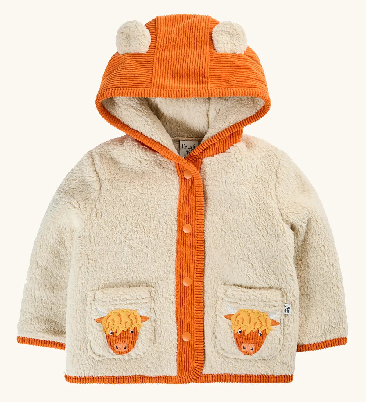 A frugi baby hooded cardigan jacket in cream sherpa with an orange corduroy hood, trim, and front placket. The hood has two cow ears, and the front pockets feature embroidered Scottish Highland cow faces.