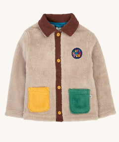 frugi kids snuggly cord jacket in twig/hotchpotch available at Babipur. A cream ted fleece style jacket with a brown cord colour. Features button fasteners, a yellow and green pouch pocker and a circular patch on the chest
