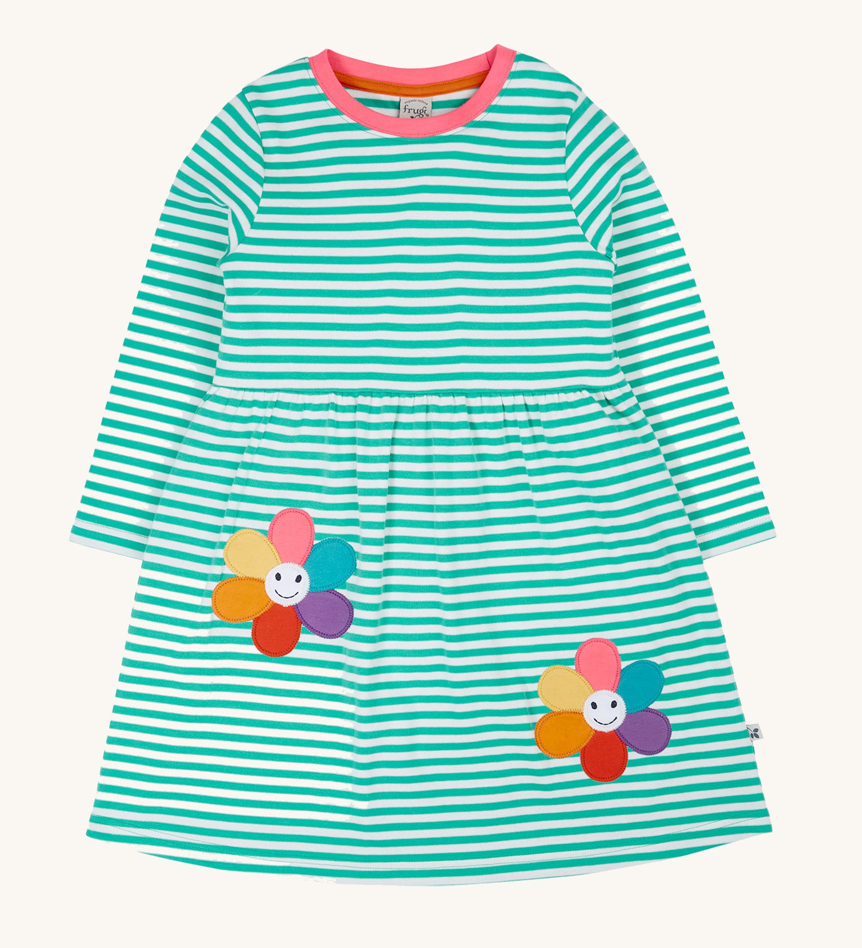 Frugi kids tammy dress in dragon stripes/flowers available at Babipur. A 100% GOTS organic cotton dress with long sleeve in light blue and white stripes with pink trim. Features 2 playful flower appliques on the skirt.