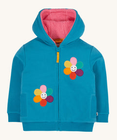 Frugi kids ted fleece hoodie in boat blue/flowers available at Babipur. A 100% Oeko-Tex cotton bright blue jersey hoodie with a pink ted fleece inner. Features a full length zip, 2 playful flower appliques and side pockets.