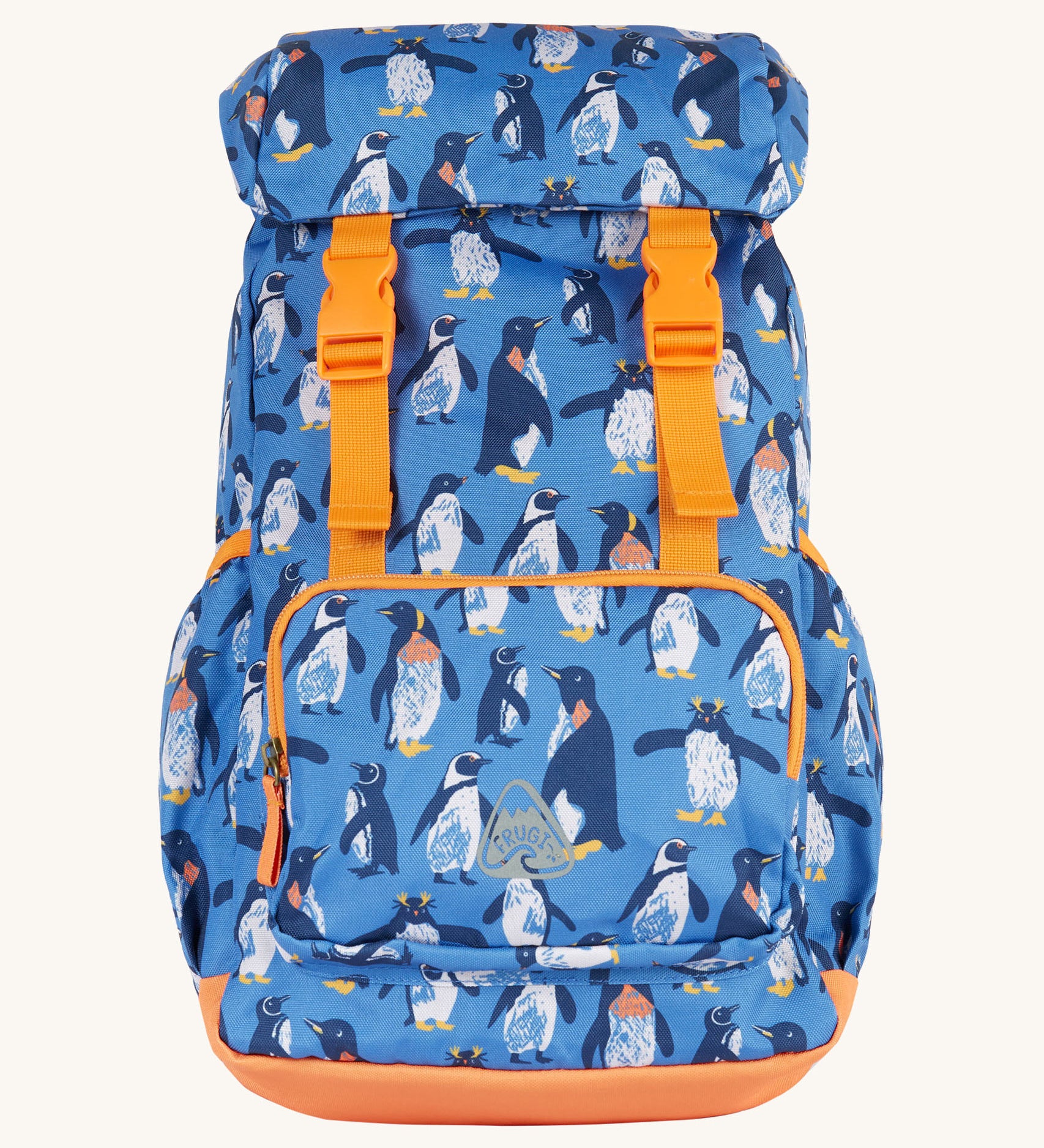 Frugi kids trail blazing backpack in penguin waddle. A blue outdoor backpack with orange trim and multiple penguin prints. Features a flip top main compartment and zipped compartment in the front with 2 bottle holders. 