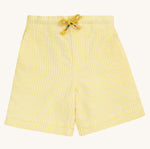 Frugi Archie Seersucker Shorts - Dandelion. A bright yellow and white striped short with an elasticated waist, side pockets and functional drawcord, made from GOTS organic Cotton on a cream background.