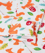 A closeup of the Frugi Organic Cotton Kimono Zip Babygrow squirrel print