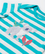 A close up of the Frugi Koala rue romper showing the grey koala applique next to pink leaves and a bamboo shoot on blue and white striped organic cotton fabric