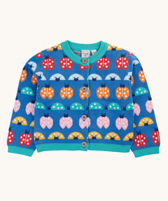 Frugi blue knitted fair isle children's cardigan with red, yellow,  blue orange and pink ladybirds all over. Button up organic cotton cardigan with four wooden buttons.