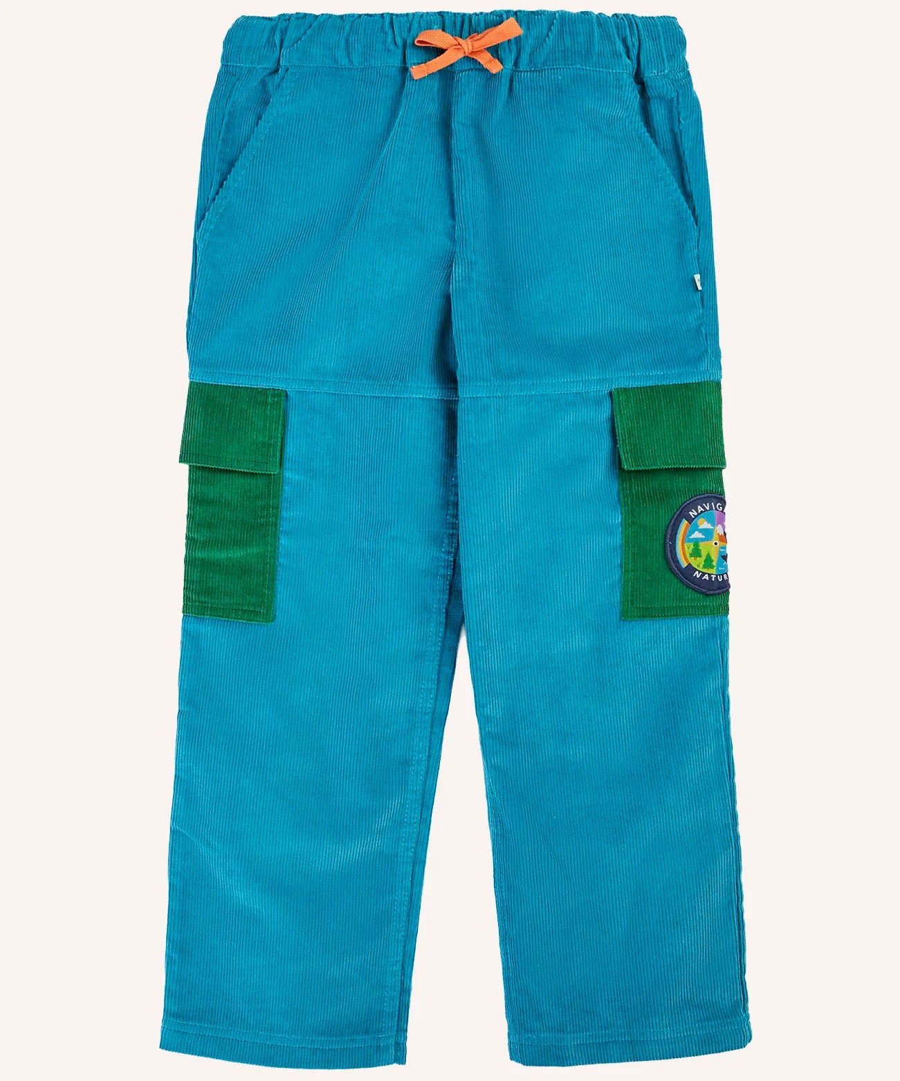 Frugi Lennox adventure trousers in boat blue organic cotton corduroy with green side pockets on the leg, one decorated with a nature themed badge.