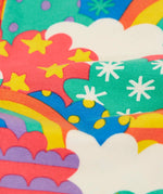Close up of the soft organic cotton of the Frugi Leona leggings with a colourful fun frenzy print.