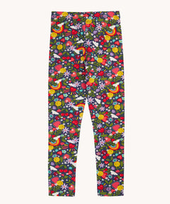 Frugi children's leggings with an all over happy days print featuring hearts, rainbows, flowers and smiley faces.