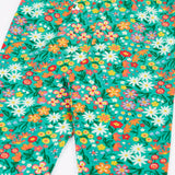 Close up of the Frugi Libby leggings with a wildflower wander all over print 