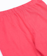 A close up of the Frugi kids libby leggings in rose showing the elasticated waist band detail on bright pink organic cotton fabric.