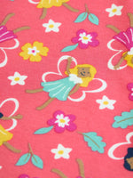 Close up of one of the fairies on the fairy flutter print on the Frugi organic cotton libby leggings. A blue flower shaped dress with white outline wings.