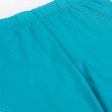 A close up of the Frugi kids libby leggings in boat blue showing the elasticated waist band detail on bright blue organic cotton fabric.
