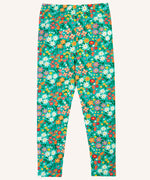 Frugi Libby organic cotton leggings with a wildflower wander all over print on a green background. 