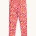Frugi organic cotton libby leggings with a fairy flutters print. Pink background with all over print featuring fairies and flowers.