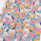 Close up of the Frugi organic cotton libby leggings with a floral flight print showing the elasticated waist. Pink background with all over print featuring flowers, foliage and Pegasus.