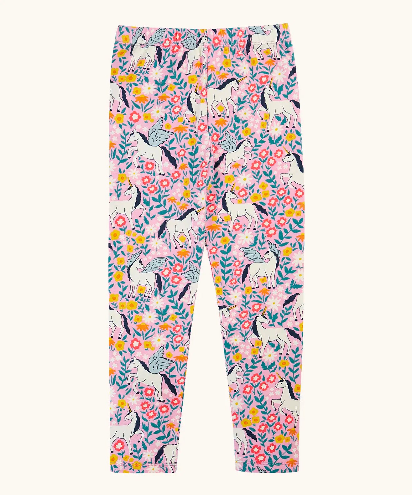 Frugi organic cotton libby leggings with a floral flight print. Pink background with all over print featuring flowers, foliage and Pegasus.